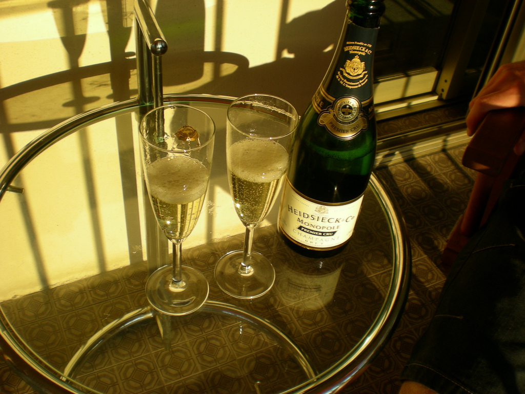 Heidsieck Co Champagne bottle with two glass flutes